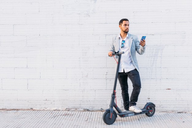 Man with Electric Scooter